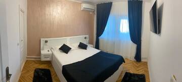 Фото номера Двухместный номер с 1 кроватью Гостевой дом Casa Cattleya г. Тыргу-Жиу 3