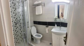 Фото номера Семейный номер Гостевой дом Casa Cattleya г. Тыргу-Жиу 3