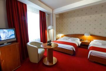 Фото номера Двухместный номер с 2 отдельными кроватями Отель Hotel Anna г. Тыргу-Жиу 12